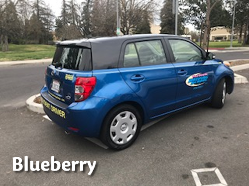 Blueberry, the blue Scion with the Turlock Driving School decals