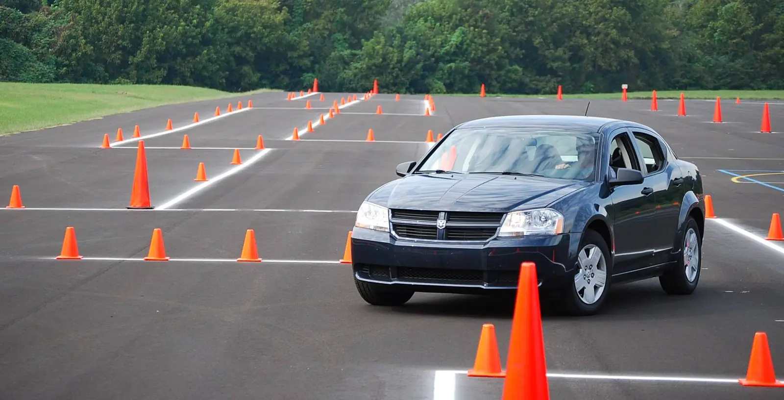 A car working through a coned manoeuvring course
