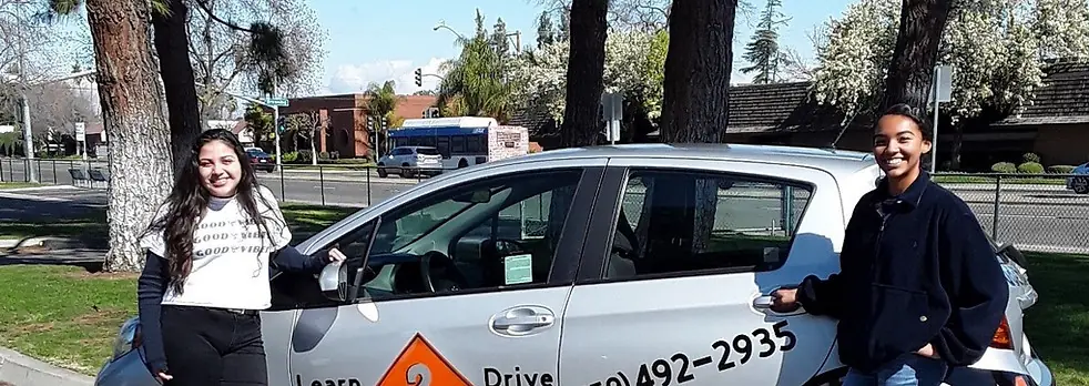 The Learn 2 Drive car, signwritten with the school name and phone number